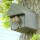 Universal nest box with entry slot